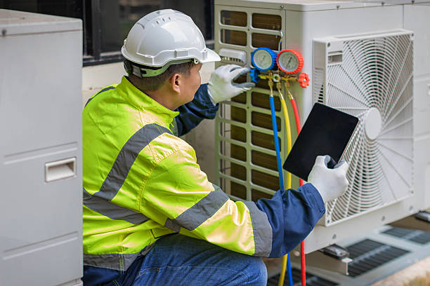 Professional Hvac technician working in Versailles, IN